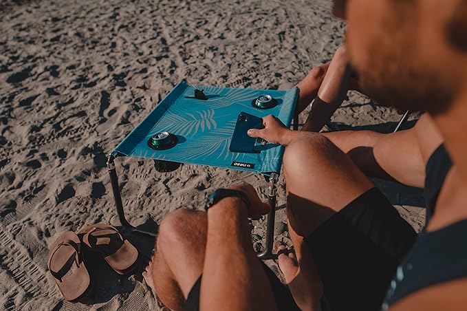 Neso Portable Beach Table with Cup Holders, Cell Phone Pockets, Lightweight for Picnics and Parks (Aqua Fronds)-VerdiqueGarden