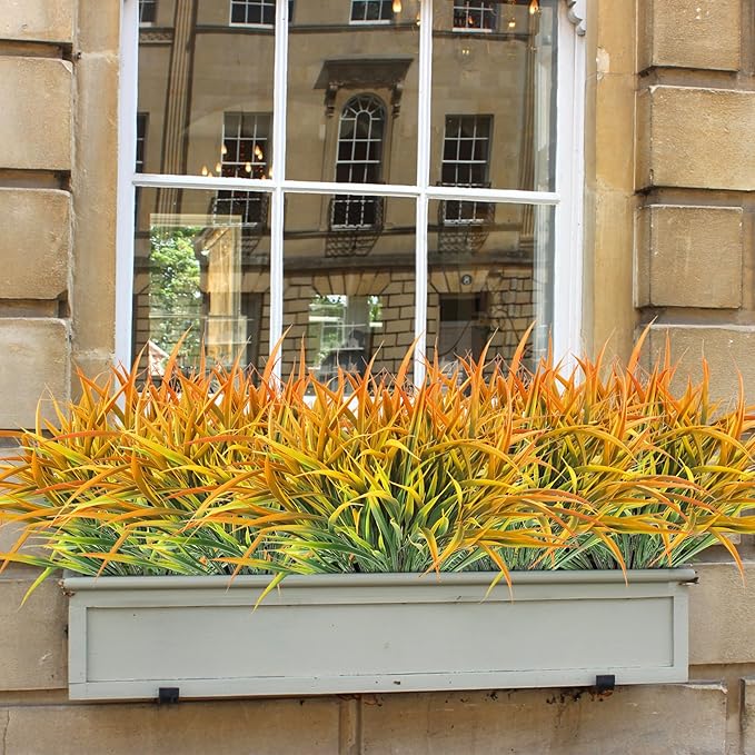 Ouddy Decor 16 Bundles Artificial Fall Plants Outdoor Fake Grass Stems UV Resistant Faux Plastic Plants Shrubs for Autumn Home Garden Pathway Farmhouse Front Porch Harvest Thanksgiving Decor, Orange-VerdiqueGarden